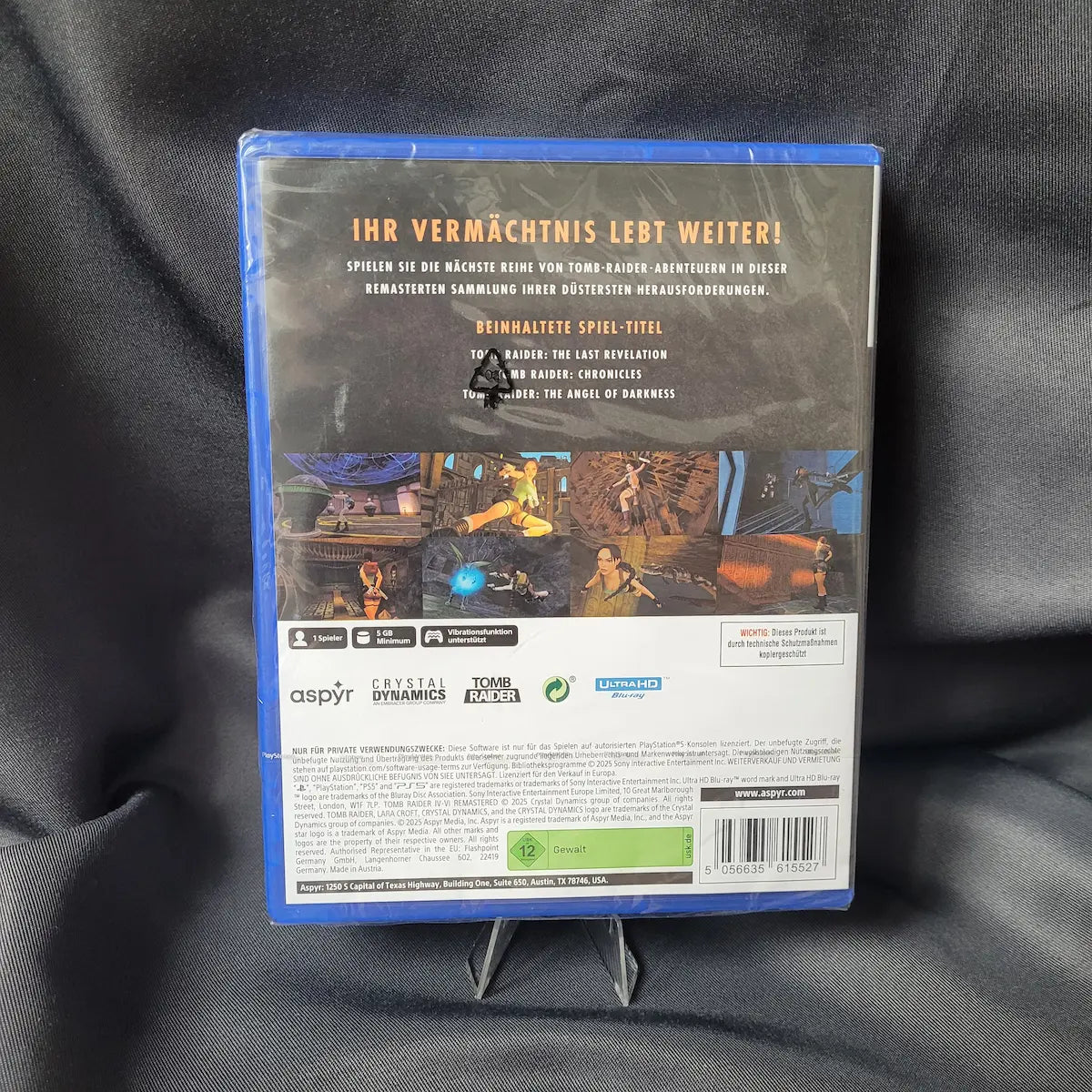 Originalverpacktes PS5-Spiel Tomb Raider IV-V-VI Remastered mit USK 12 Freigabe. Rückseite.