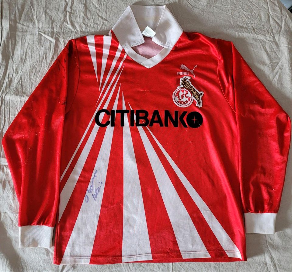 Rotes 1. FC Köln Auswärtstrikot Saison 1991/92 mit authentischen Unterschriften von Bodo Illgner und Pierre Littbarski, Vintage Fußball-Sammlerstück, West Germany Edition