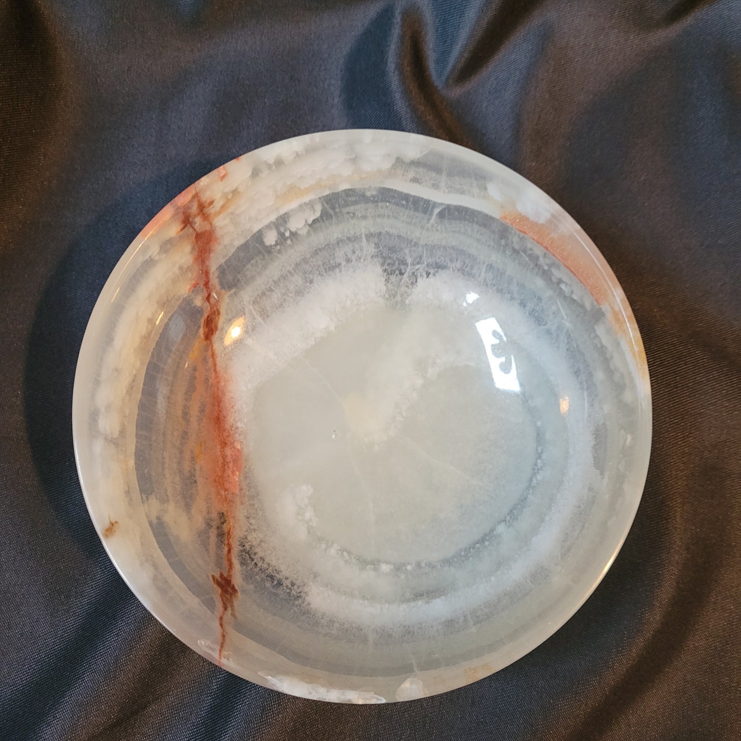 Dekorative Schale aus Onyx – Hersteller AOM – Vintage, poliert mit individueller Natursteinmaserung in Creme-, Braun- und Rottönen, ca. 12 × 4,5 cm, ideal als Sammlerstück oder Wohnaccessoire.