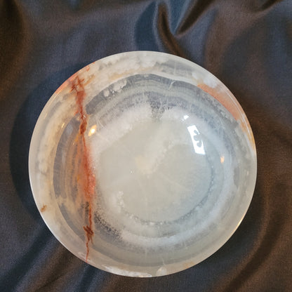 Dekorative Schale aus Onyx – Hersteller AOM – Vintage, poliert mit individueller Natursteinmaserung in Creme-, Braun- und Rottönen, ca. 12 × 4,5 cm, ideal als Sammlerstück oder Wohnaccessoire.