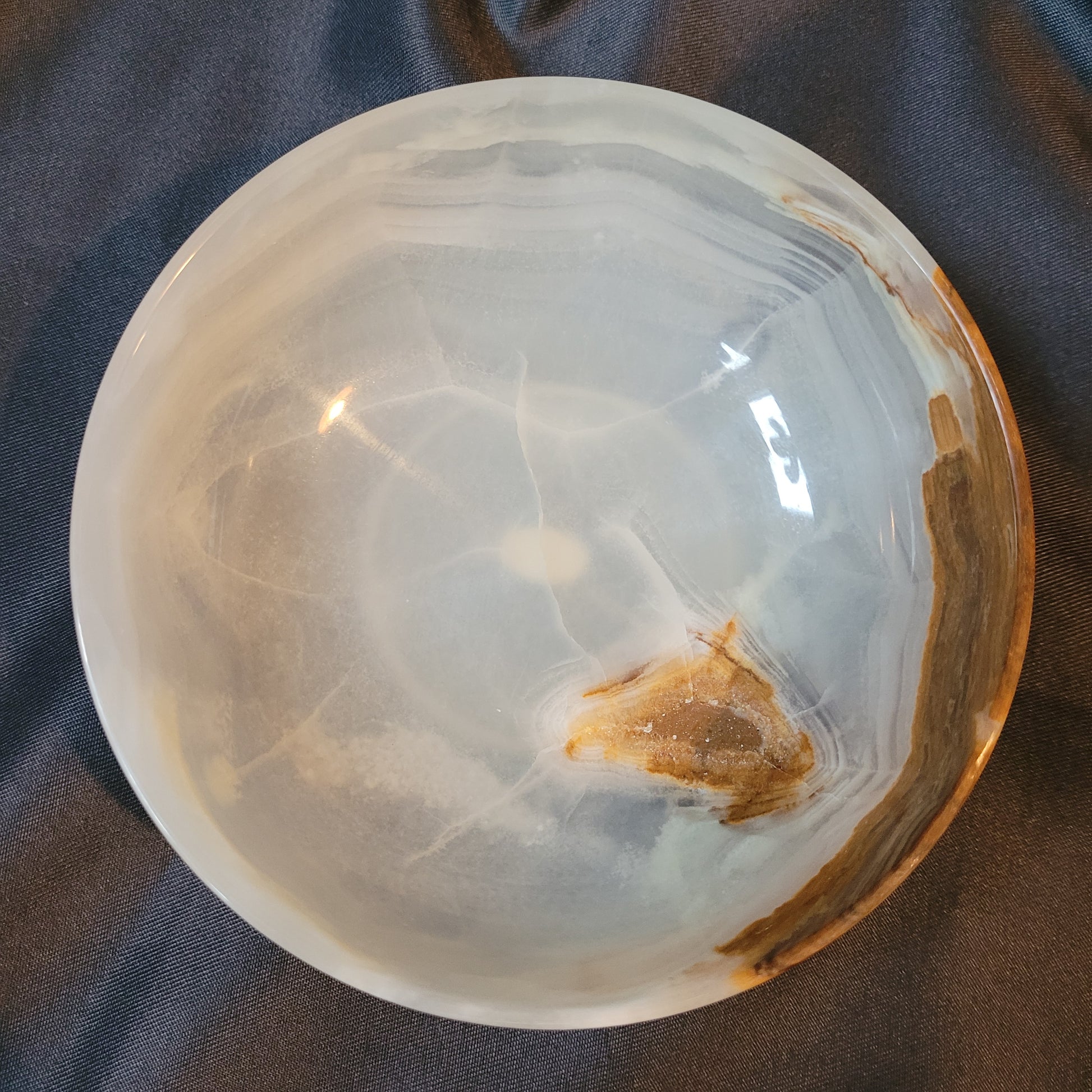 Dekorative Schale aus Onyx – Hersteller AOM – Vintage, poliert mit individueller Natursteinmaserung in Creme-, Braun- und Rottönen, ca. 12 × 4,5 cm, ideal als Sammlerstück oder Wohnaccessoire.