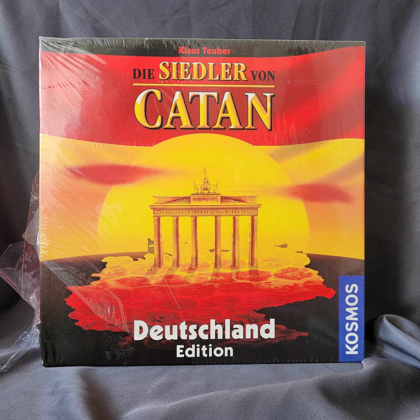 ie Siedler von Catan – Deutschland Edition Brettspiel von Kosmos, Sonderausgabe mit Brandenburg Tor auf dem Cover, Strategiespiel von Klaus Teuber, EAN 4002051693015
