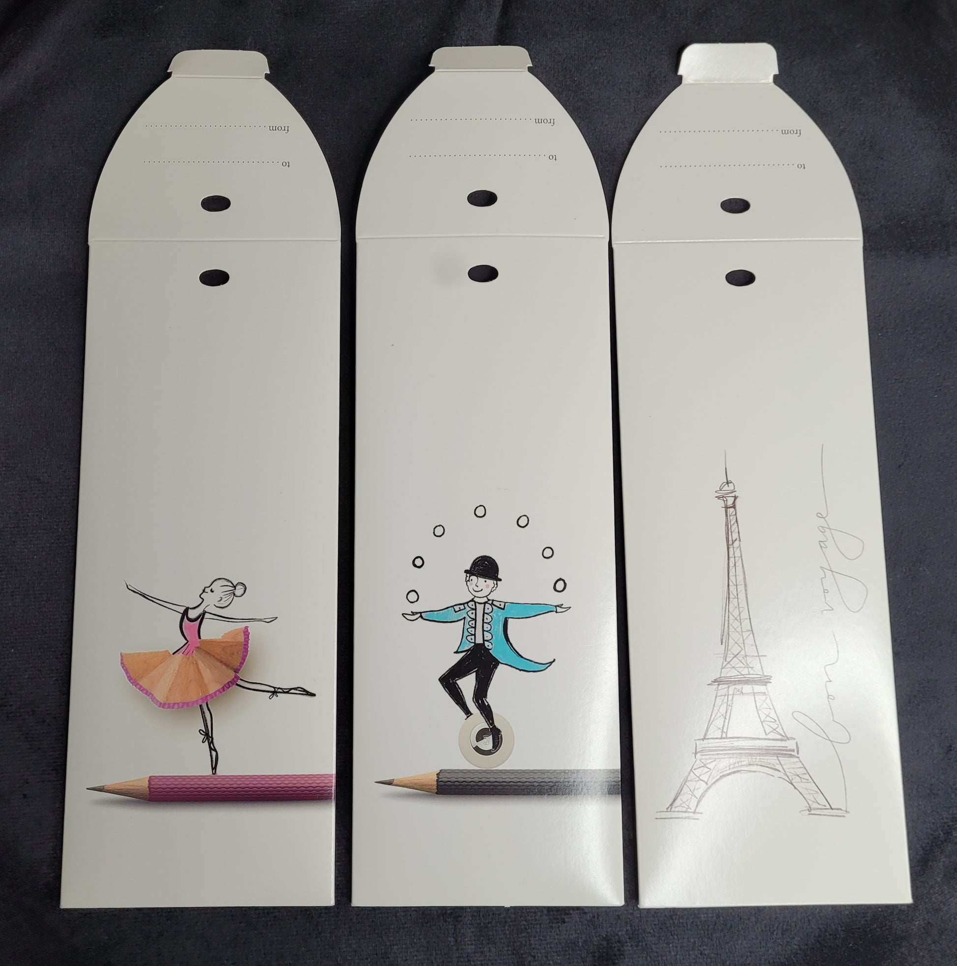 Drei Geschenkkarten von Graf Faber Castell, designed by Kara Till, mit Illustrationen einer Ballerina, eines Jongleurs und des Eiffelturms.