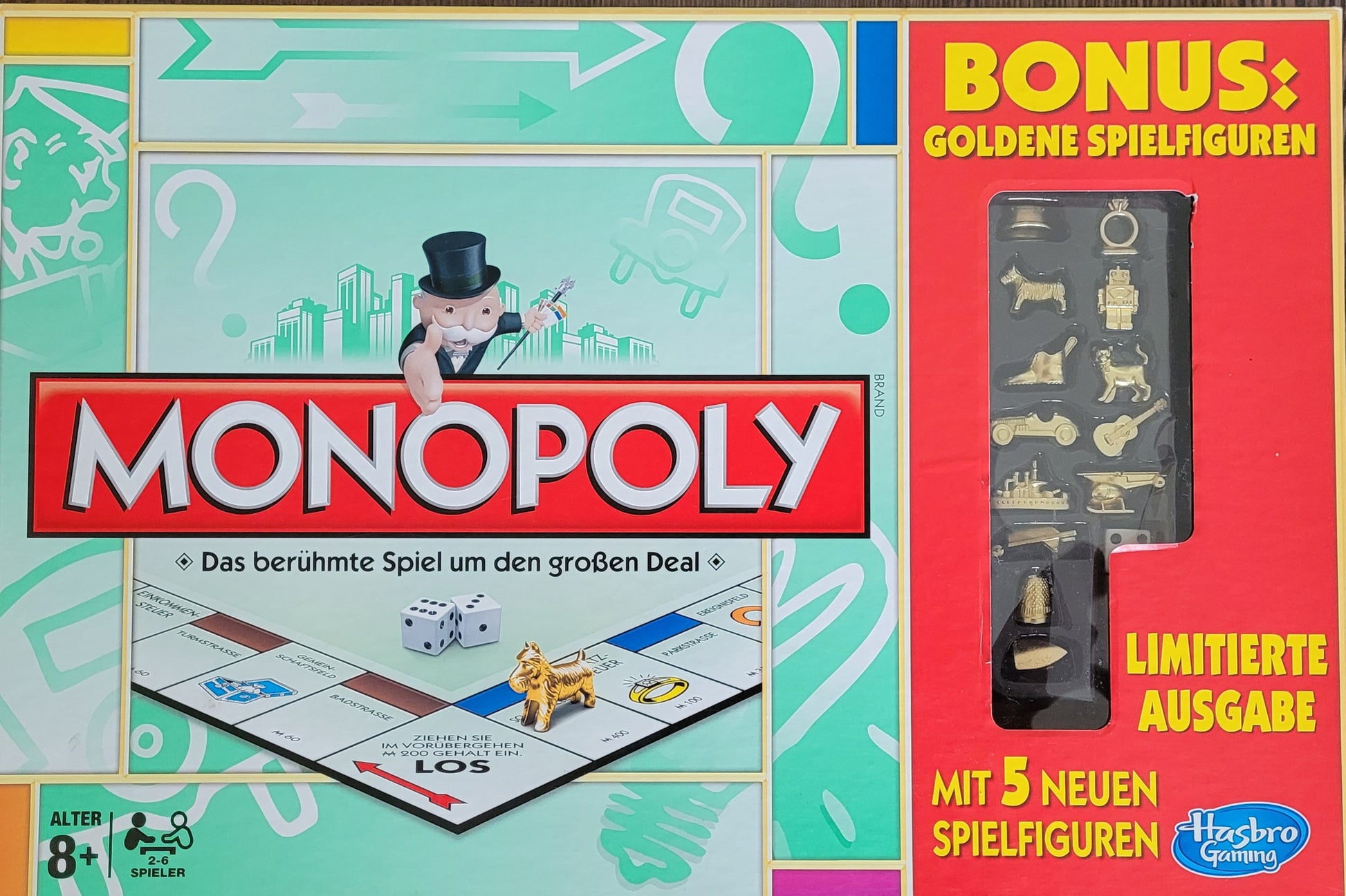 Vorderseite der Monopoly Limitierte Ausgabe von Hasbro – exklusives, rotes Design mit ikonischem Monopoly-Logo und glänzenden, goldenen Spielfiguren. Limitierte Ausgabe für anspruchsvolle Sammler.