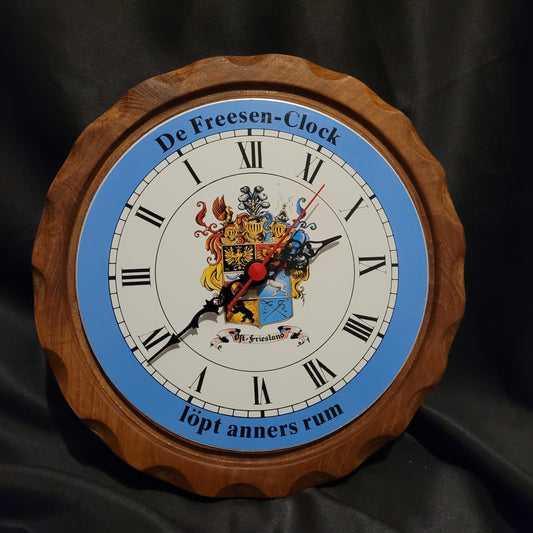 Ostfriesenuhr Ostfriesland Rückwärts-Uhr Vintage mit Holzrahmen, Ø ca. 25 cm, römischen Ziffern und farbigem Wappen im Ziffernblatt – dekorative Kult-Wanduhr.
