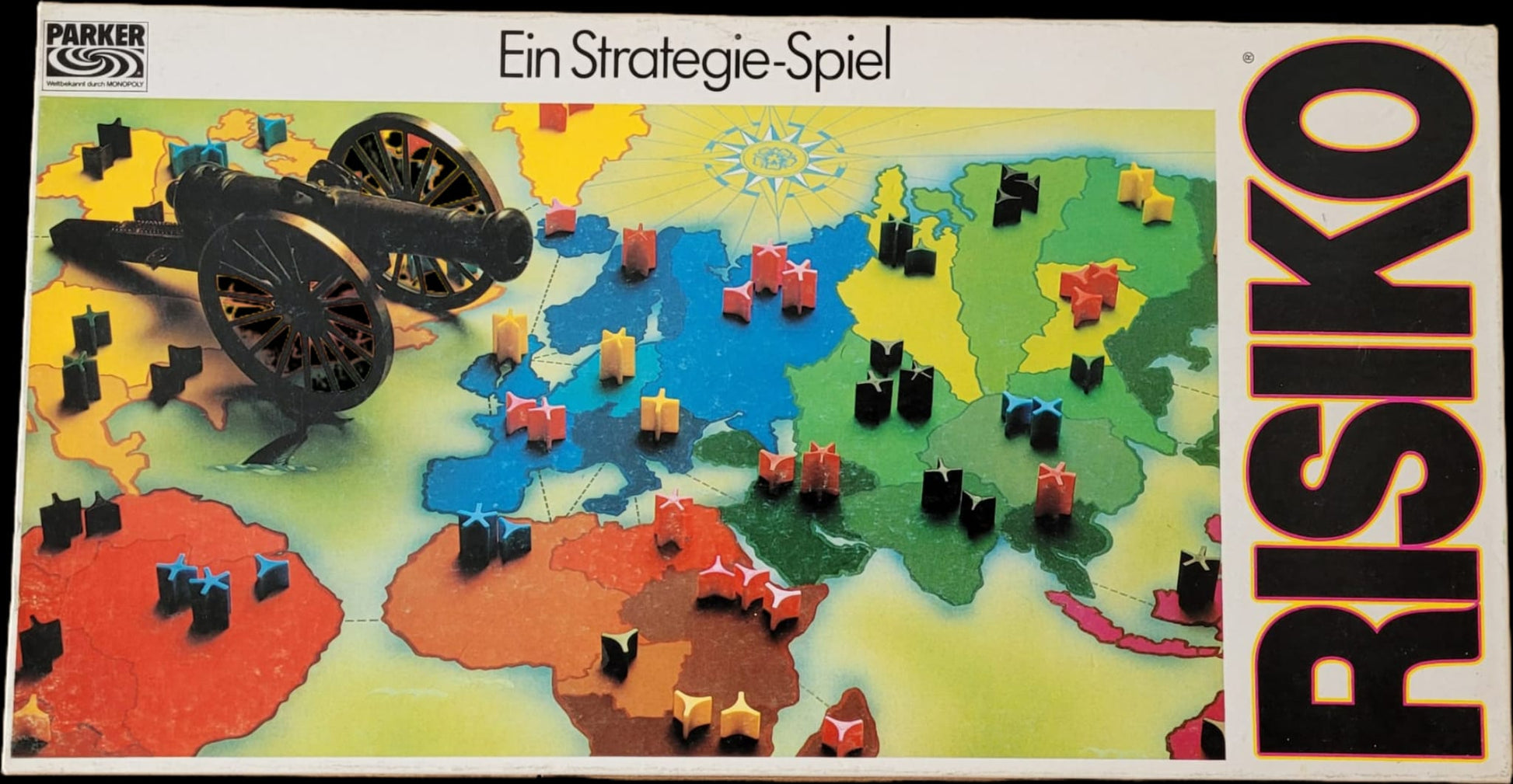 Vintage Brettspiel Risiko – Parker Strategiespiel in OVP, Cover mit Weltkarte, bunten Armeesteinen und Kanone, klassisches Strategie-Spiel für Sammler und Liebhaber historischer Gesellschaftsspiele.