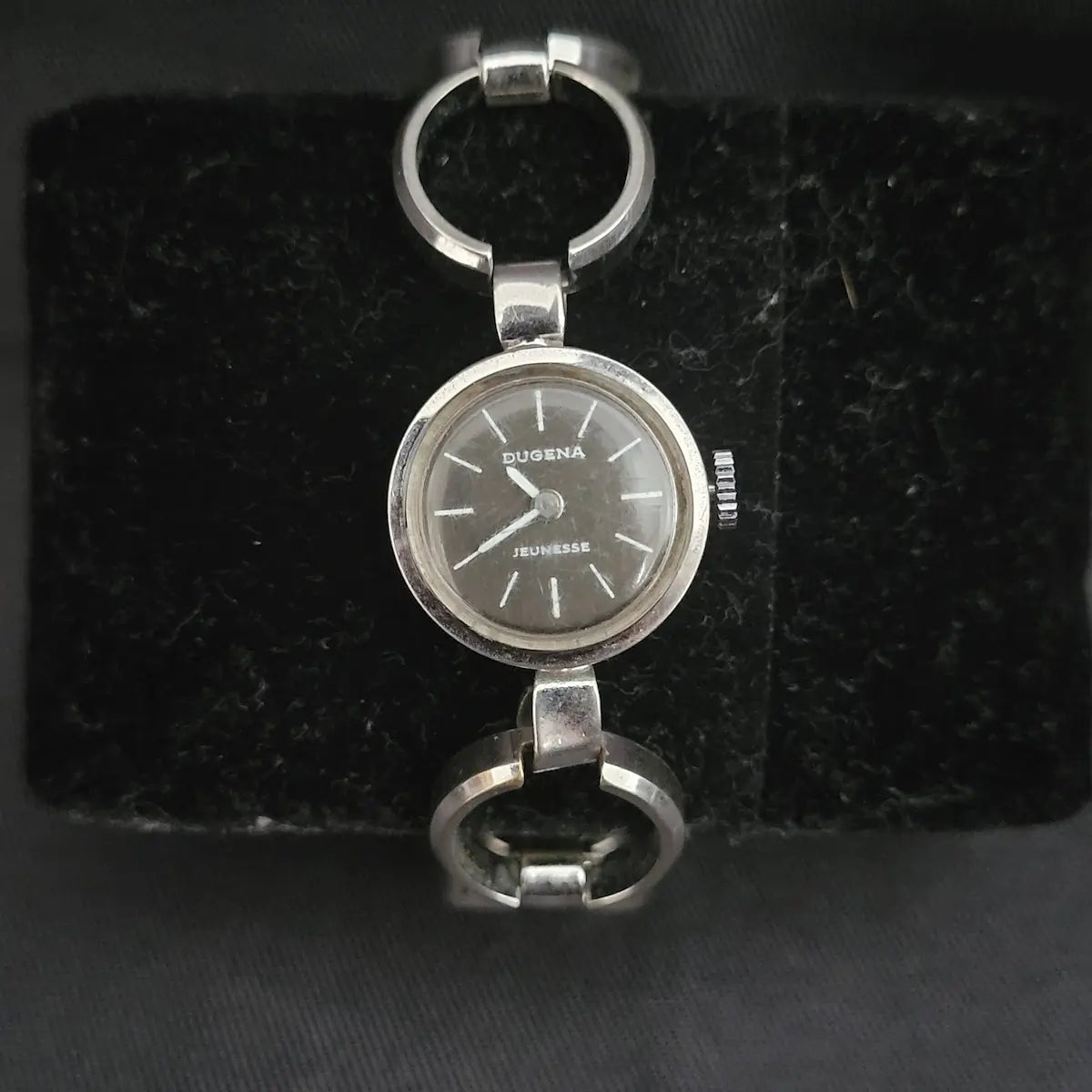 Klassische Dugena Jeunesse Automatik Armbanduhr mit rundem Gehäuse und filigranem Armband im Vintage-Stil.
