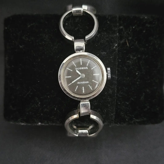 Klassische Dugena Jeunesse Automatik Armbanduhr mit rundem Gehäuse und filigranem Armband im Vintage-Stil.