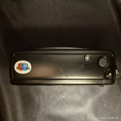 Minolta Riva AF 35EX analoge Kamera Oberseite mit Auslöser und Rote-Augen-Reduzierung.