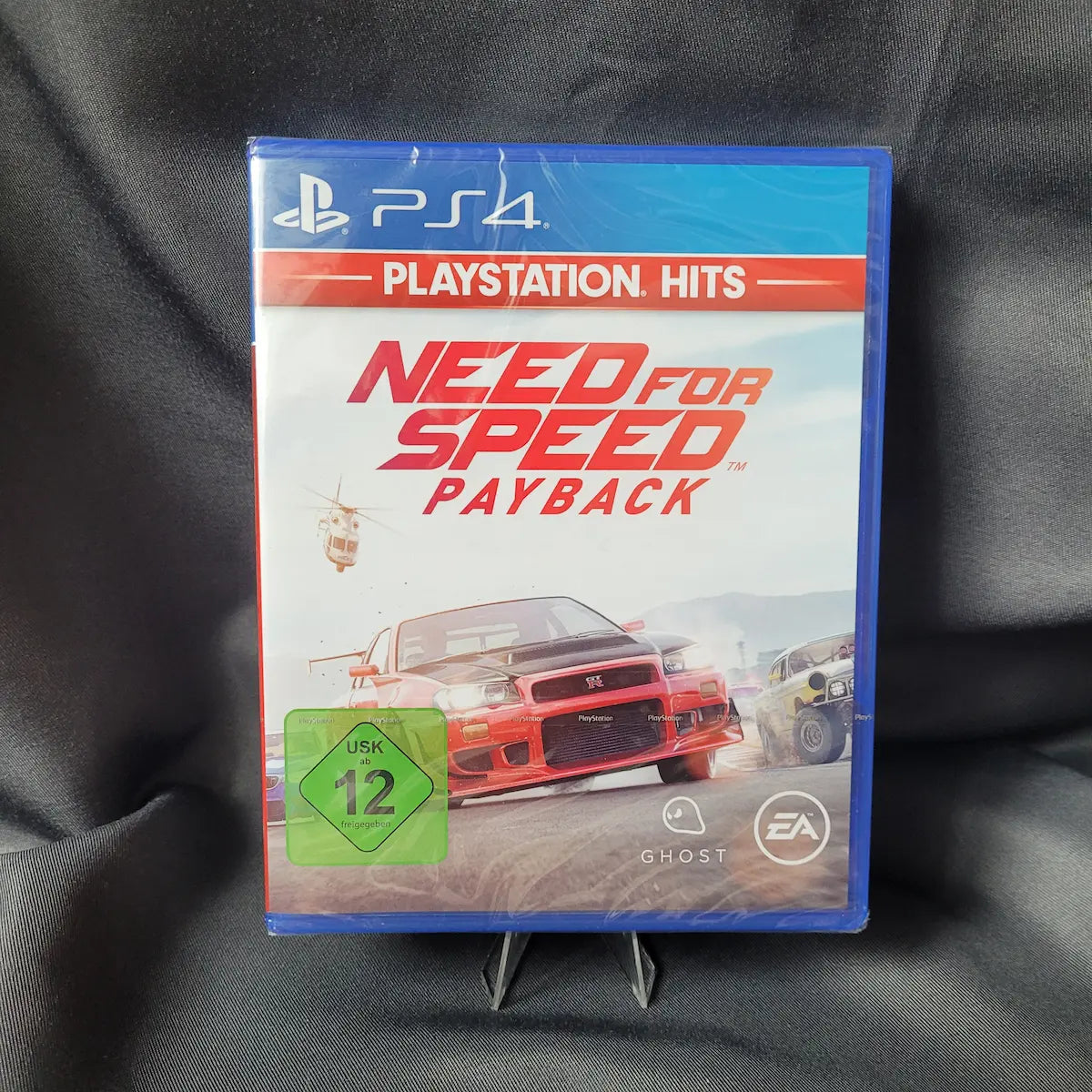 Originalverpacktes PS4-Spiel Need for Speed Payback aus der PlayStation Hits Reihe mit USK 12 Siegel.
