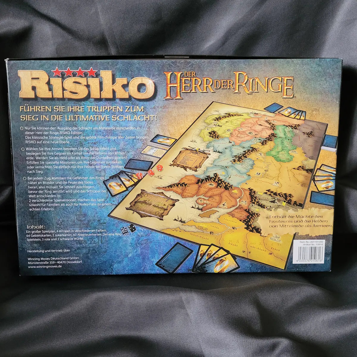 Rückseite der Spielebox von Risiko – Der Herr der Ringe (verbesserte Neuauflage) mit Motiven aus der Filmtrilogie.