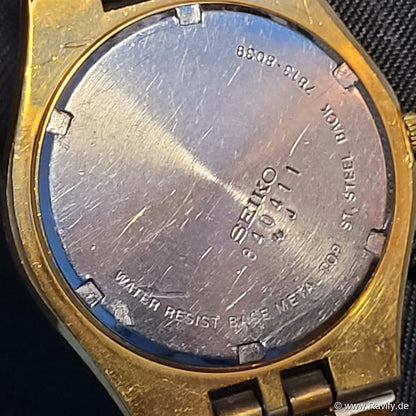 Klassische goldfarbene Seiko SQ Quartz Herrenuhr aus dem Jahr 1978 mit vergoldetem Gliederarmband und Tag-Datum-Anzeige.