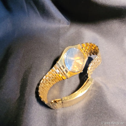 Klassische goldfarbene Seiko SQ Quartz Herrenuhr aus dem Jahr 1978 mit vergoldetem Gliederarmband und Tag-Datum-Anzeige.