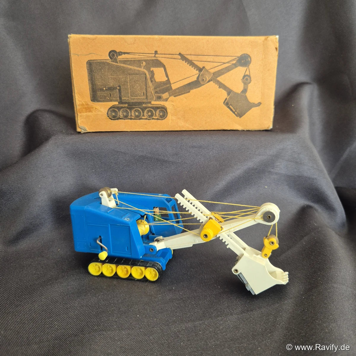Siku V-Serie V130 Löffelhochbagger Menck M 60 in Blau mit gelben Ketten und Originalschachtel (OVP)
