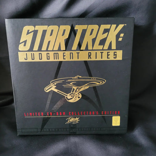 Lieferumfang der Star Trek: Judgment Rites Limited Collector's Edition mit Spielanleitung, VHS-Kassette "Der Käfig" und Sammler-Pin.